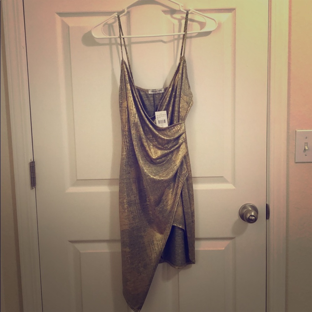 Gold & black metallic asymmetrical length dress.